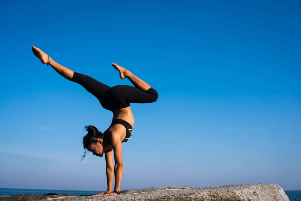 How Much Does The Wellness Way Cost? A Detailed Comparison of Wellness Services 3 Woman-With-Arms-Outstretched-Against-Blue-Sky
