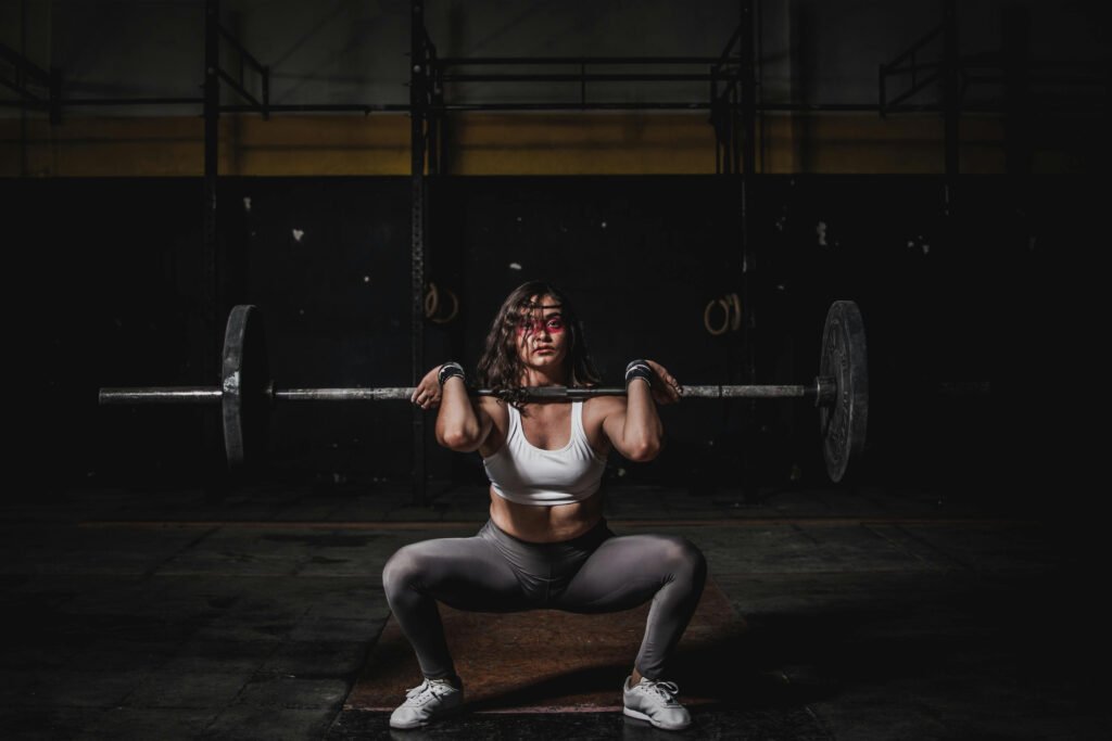 What Is Wellness Bodybuilding? Your Ultimate Guide 5 photo-of-a-woman-lifting-barbell