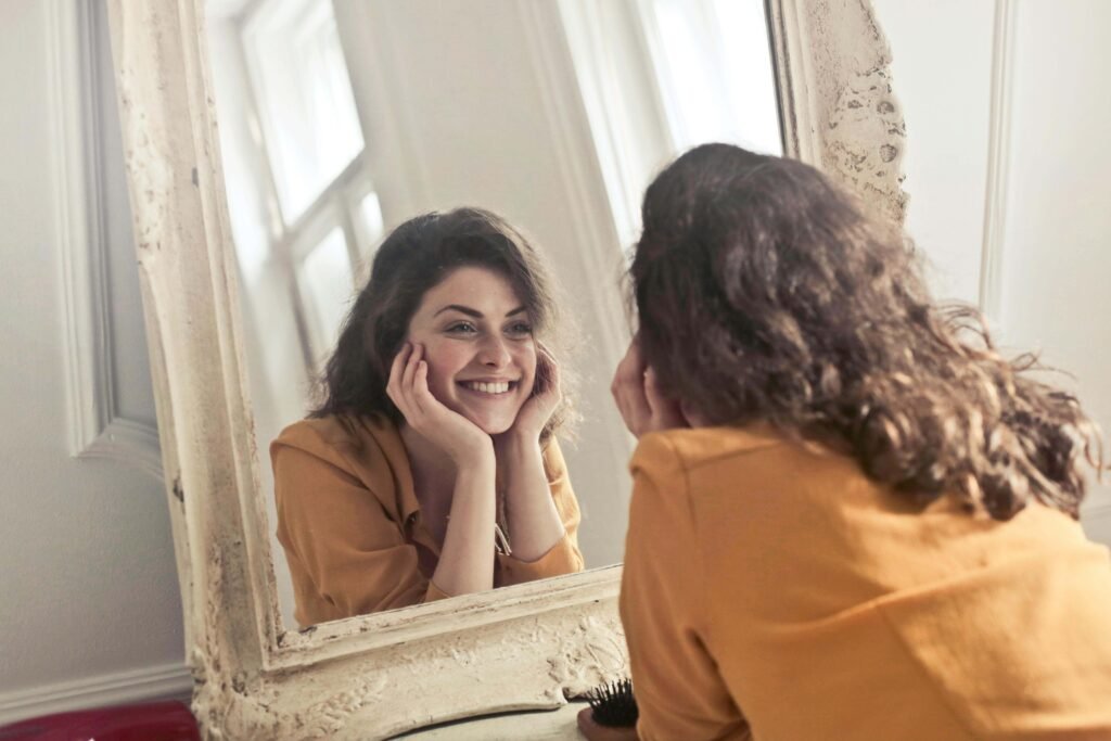 The Complete Guide to Happy Health and Wellness 6 photo-of-a-woman-looking-at-the-mirror