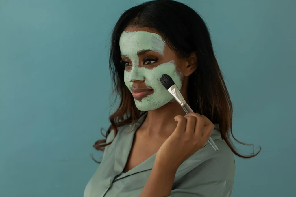 The Power of Advanced Aesthetics and Wellness 1 photo-of-a-woman-putting-on-facial-cream-with-a-brush-